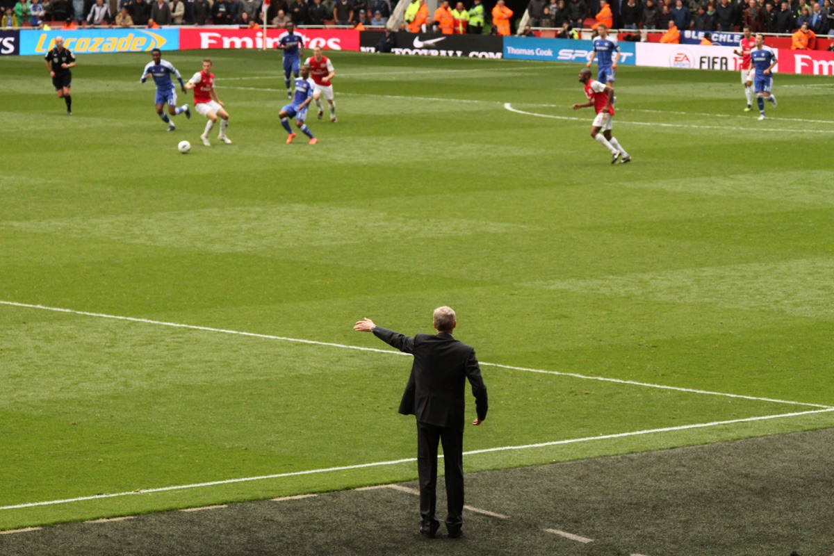 Arsene Wenger directing his Arsenal team from the touchline